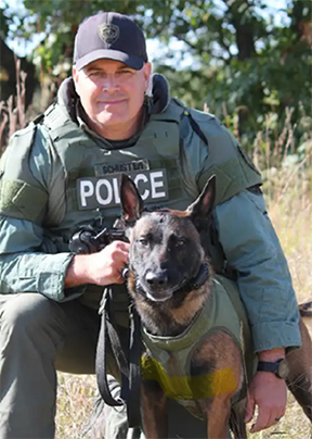 Sgt. Schuster and Zeus.
