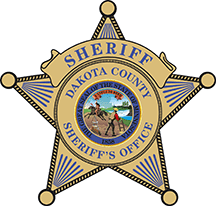 Golden five-point star that says Dakota County Sheriff’s Office with the Minnesota state seal.