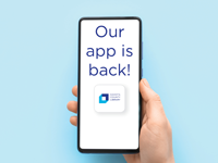 Close up of a hand holding a smartphone that says "Our app is back!".