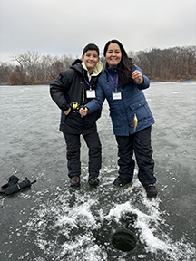 Two people ice fishing at Lebanon Hills Regional Park.