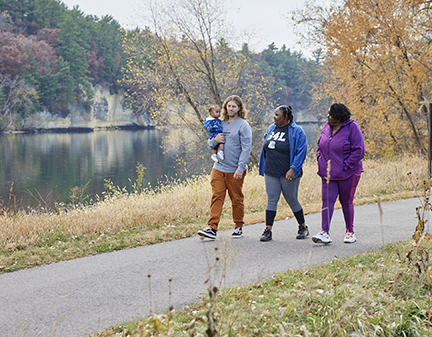 Family walking Lake Byllesby Trailhead.