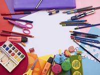 Art supplies, including markers, paints and brushes.